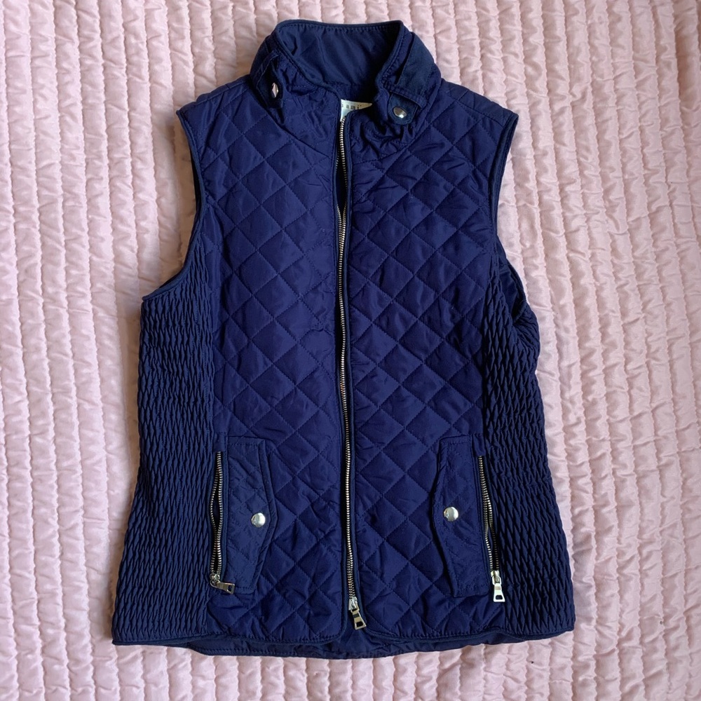Blue vest with gold detailing